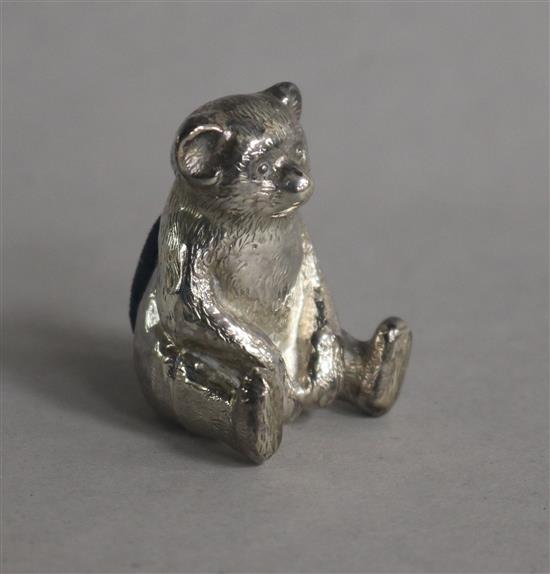 A George V silver mounted teddy bear pin cushion, Robert Pringle & Sons, Birmingham, 1910, 34mm.